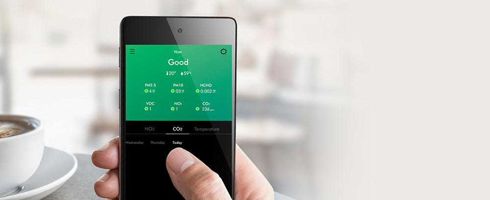 The MyDyson app being used at a café.