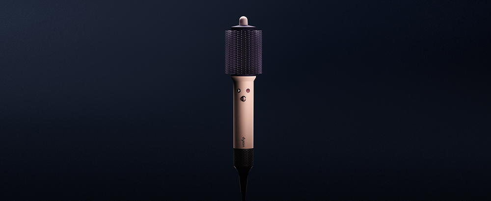 深色背景上的 Dyson Airsmooth 造型梳。