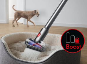 Red Boost mode logo over an image of a Hair screw tool cleaning a pet bed.