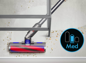 Blue Med mode logo over an image of the Slim Fluffy cleaner head reaching under desk legs.