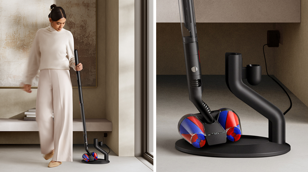 Person placing Dyson Pencilvac cleaner in charging doc