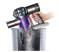 Dyson DC58 being emptied into the bin