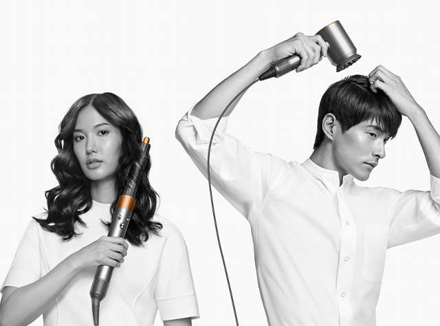 Three models using the Dyson hair care range to dry or style their hair