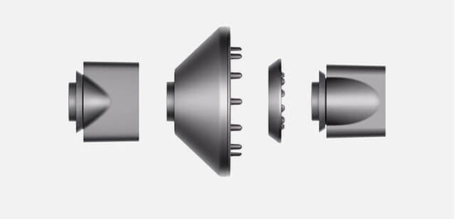 A woman holding the Dyson digital motor V9
