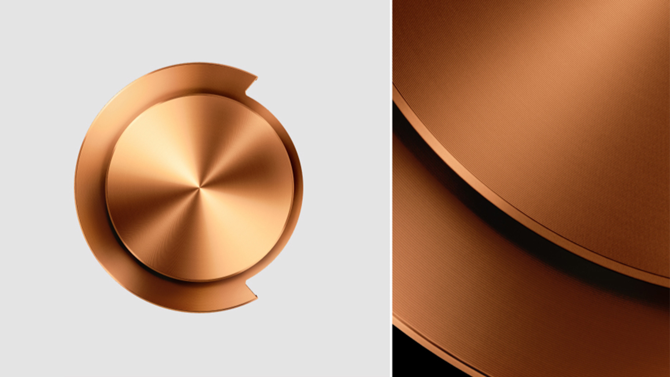 A close-up shot and an extreme close-up shot of an outer cap for Dyson OnTrac headphones.